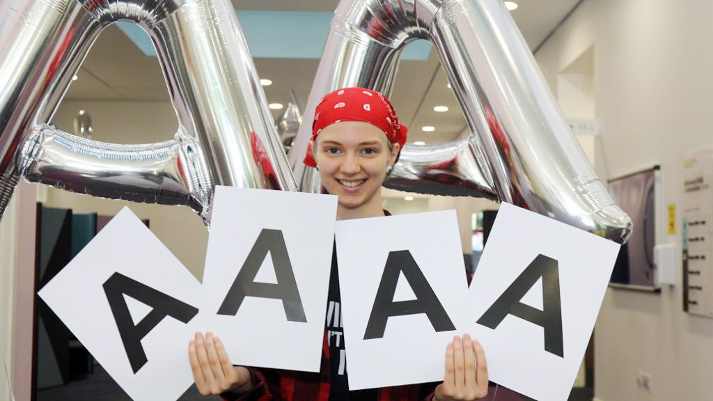 Student with her A grades 