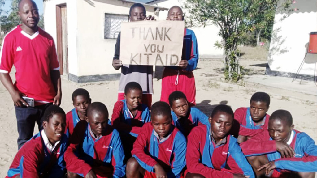 Children in their football kits 