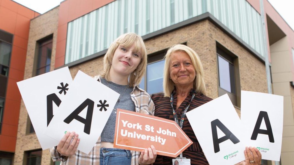 Amy Platt with Sam Wright celebrating results 