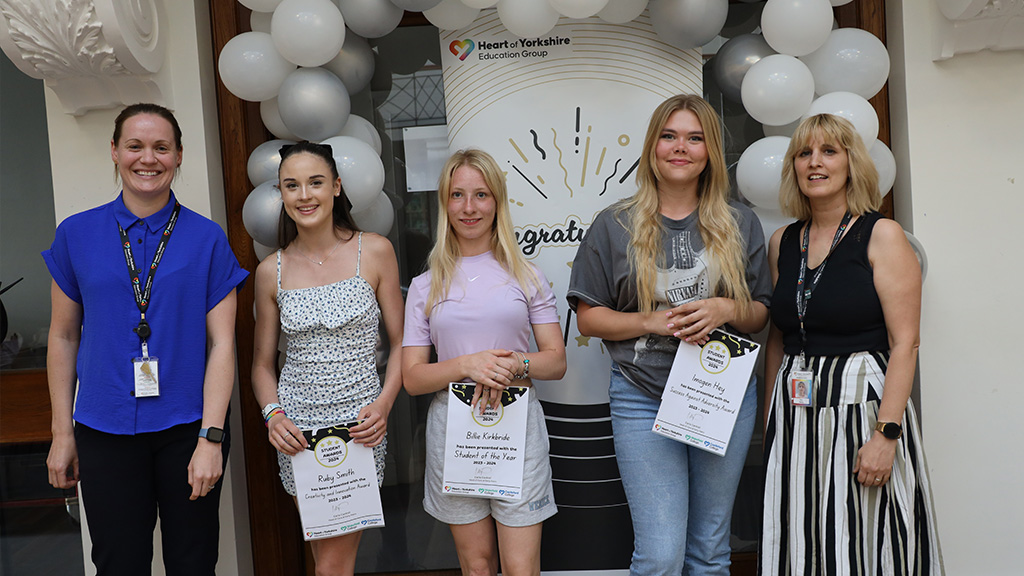 Students with their certificates 