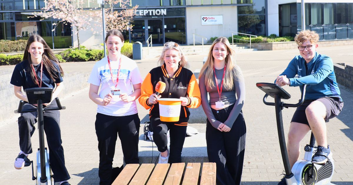 Selby College students taking part in the 24-hour cyclethon with York Mix presenter Victoria Charles