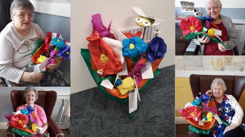 Care home residents with their flowers 