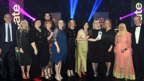 Staff celebrating Wakefield College's win 