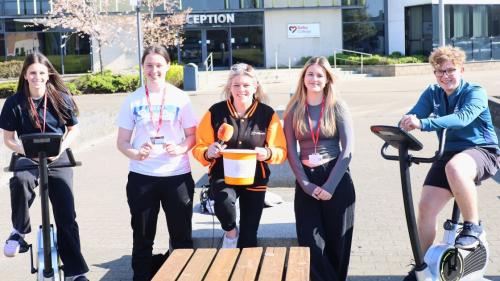 Selby College students taking part in the 24-hour cyclethon with York Mix presenter Victoria Charles