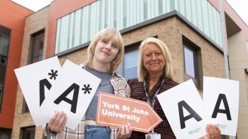 Amy Platt with Sam Wright celebrating results 