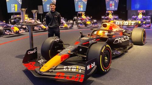 Former student with F1 racing car 